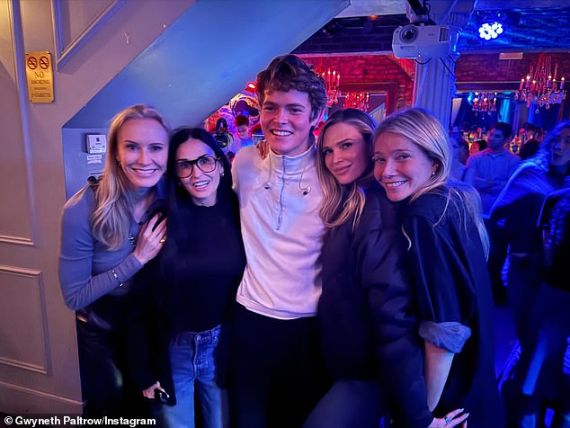 Gwyneth Paltrow's son Moses Martin towered over her (R), author Amy Griffin (L), actress Demi Moore (2-L) and producer Sara Foster (2-R) following a recent concert with his newly-renamed band, People I've Met