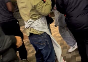 In a video, one man held a rag to his head as crimson-coloured blood seeped through