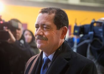 Rep. Jesus "Chuy" Garcia arrives at his polling place to vote on election day Feb. 24, 2015, in Chicago, Illinois.