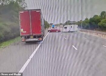 Dashcam footage, taken by lorry driver Lee Flower, shows a red car lose control as it speeds down the M5 motorway
