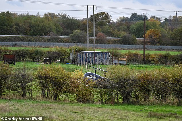 The 70-year-old man, who was a passenger in the helicopter, was treated for 'serious injuries' by medics - but despite their best efforts, he was sadly pronounced dead at the scene (pictured)