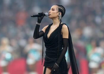 Karina Pasian sings the national anthem prior to the NFL 2025 game between Washington Commanders and Miami Dolphins at Estadio Santiago Bernabeu on Nov. 16, 2025, in Madrid, Spain.