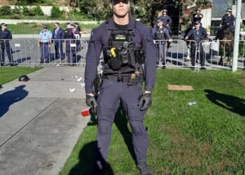 Australians admired a NSW Police officer from the riot squad after a fiery protest in Sydney