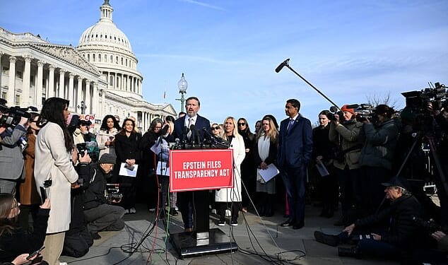 U.S. Representative Thomas Massie (R-KY), accompanied by U.S. Representatives Marjorie Taylor Greene (R-GA) and Ro Khanna (D-CA), speaks during a press conference on the Epstein Files Transparency Act ahead of a House vote on the release of files related to the late convicted sex offender Jeffrey Epstein, on Capitol Hill in Washington, D.C., U.S., November 18, 2025