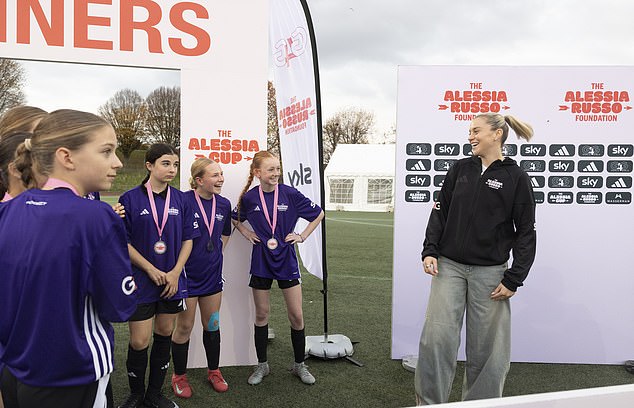 It takes Russo over an hour to sign every single shirt, boot and bag belonging to the nearly 200 girls who take part in her inaugural Alessia Russo Cup, set up the Alessia Russo Foundation