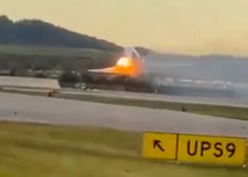 The plane's left wing was on fire as it took off from Louisville Muhammad Ali International Airport last night