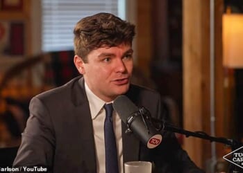 Self-proclaimed white nationalist pundit Nick Fuentes speaking on The Tucker Carlson Show
