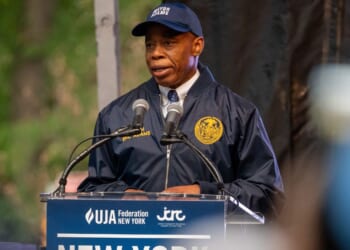 Then-New York Mayor Eric Adams speaks to thousands of listeners at a vigil for Israel in New York City on Oct. 10, 2023.
