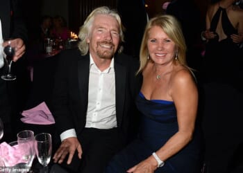 Joan Branson, who has died aged 80, acted as a 'rock' for her billionaire husband Sir Richard (pictured: the couple together in 2013)