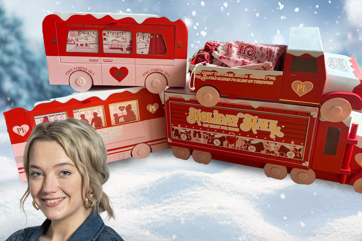 Woman smiling with red and pink holiday-themed boxes in the shape of a bus and a train.