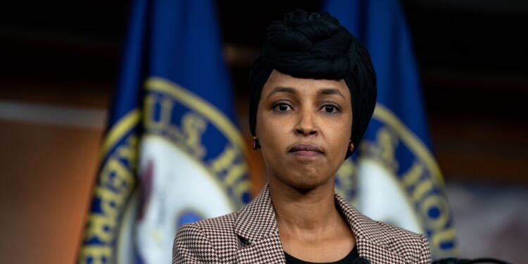 Rep. Ilhan Omar, a Democrat from Minnesota, looks on during a news conference on reintroducing the Neighbors Not Enemies Act on Capitol Hill on Jan. 22, 2025, in Washington, D.C.