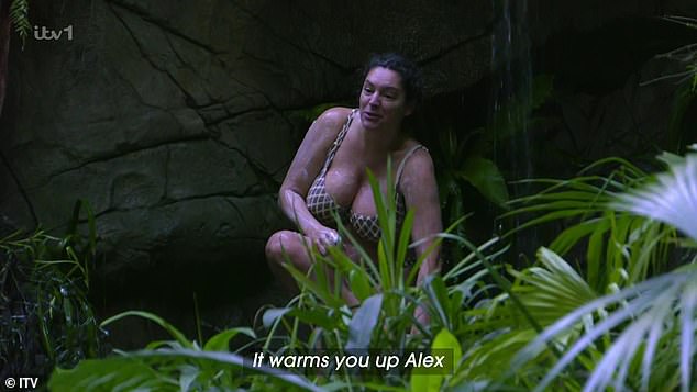 The radio presenter, 45, stripped down to a diamond print bikini to take a trip to the famous shower, where she revealed her controversial habit to fellow campmate Alex Scott, 41