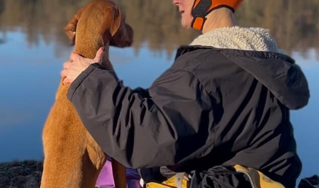 Swimming in wild, open water is the antithesis of a noisy, chlorine-filled pool, writes Jane Clarke, pictured with her dog Kuomi
