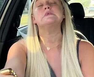 Olivia Woodrich posted a video showing her driving around while having tics