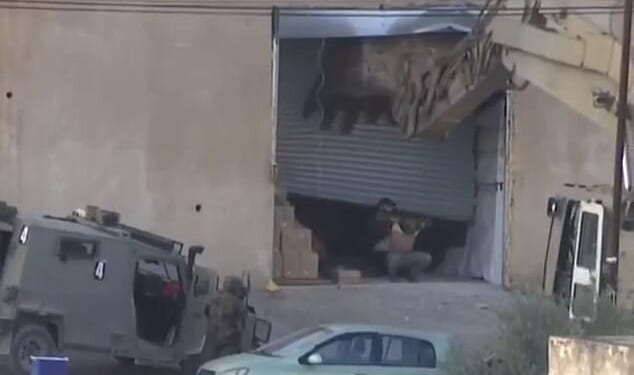 Israeli troops have been accused of executing two unarmed Palestinian men who surrendered during a raid in the West Bank.