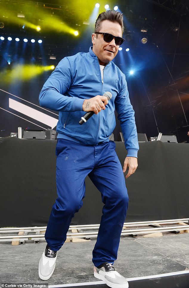 Robbie Williams says he typically serenades an audience member with his hit song She’s The One, but can barely see the person he’s singing to as his eyesight has become blurry recently