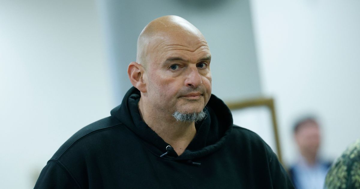 Sen. John Fetterman, a Democrat from Pennsylvania, walks to vote at the U.S. Capitol on Oct. 8, 2025, in Washington, D.C.