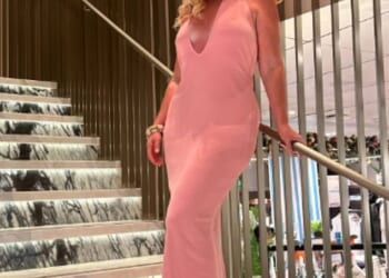 Josie Gibson showed off her amazing five stone weight-loss as she slipped into a glamorous pink plunging dress during a lavish Caribbean cruise on Friday