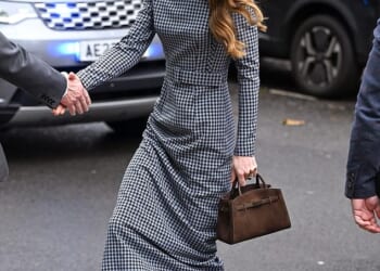 The Princess of Wales wowed in a monochrome dress today as she visited children's mental health charity Anna Freud