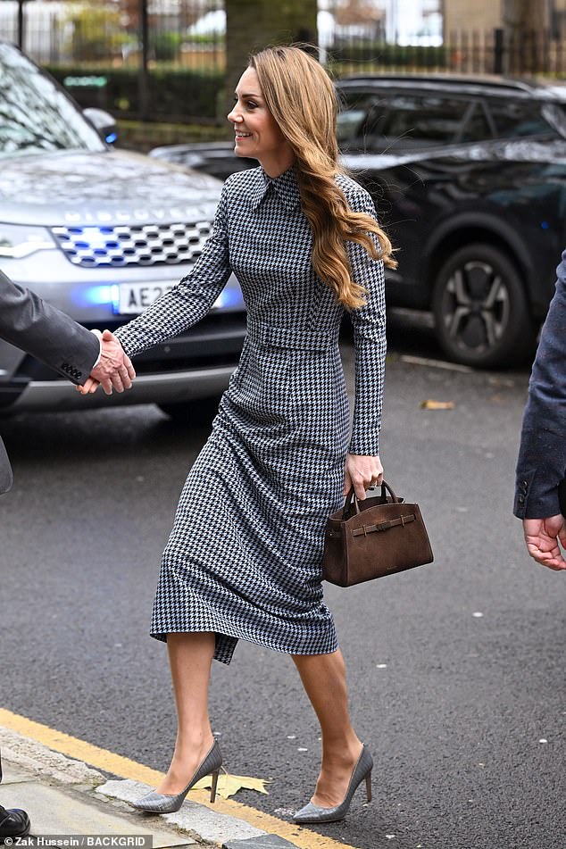 The Princess of Wales wowed in a monochrome dress today as she visited children's mental health charity Anna Freud