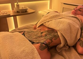 Katie Price displayed her extremely tiny waist as she underwent an intimate treatment on Monday