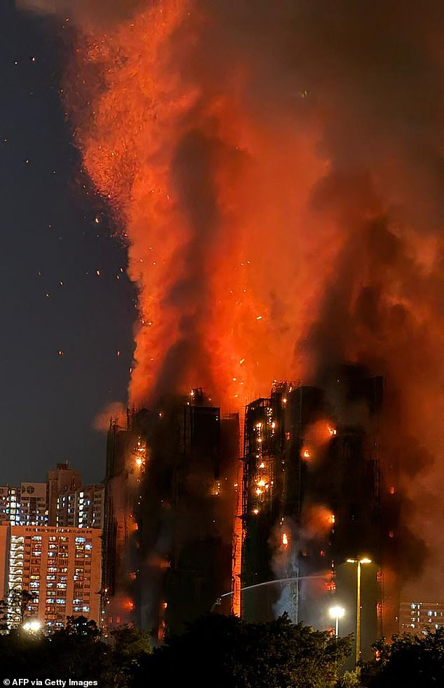 The message comes as the search for bodies in the scorched skyscrapers continues, with authorities warning that the death toll could still rise further. People gathered on a nearby overhead walkway, watching in dismay as smoke billowed from the buildings while scores of fire engines and ambulances lined the road below the complex