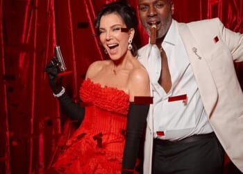 Kris Jenner, 70, looked like the ultimate Bond girl as she brandished a pistol at her 007-themed birthday party