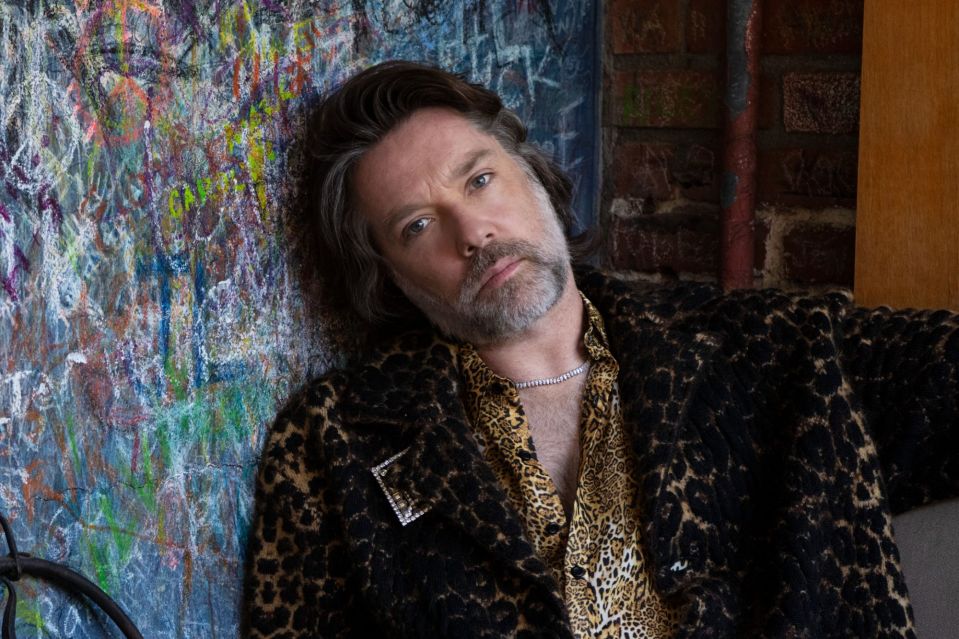 An image collage containing 1 images, Image 1 shows Rufus Wainwright, an American-Canadian singer-songwriter, poses for a portrait