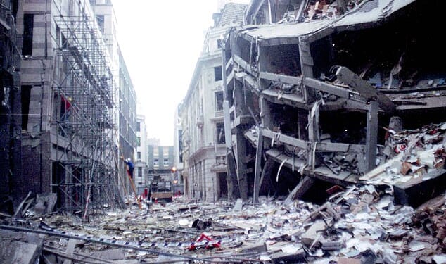 Labour has been accused of letting IRA terrorists ¿rewrite history¿ after it emerged former paramilitaries may sit on a veterans¿ board - as nine fresh cases look set to be brought against British army veterans. Pictured: the aftermath of the IRA bomb which destroyed London's Baltic Exchange in April 1992