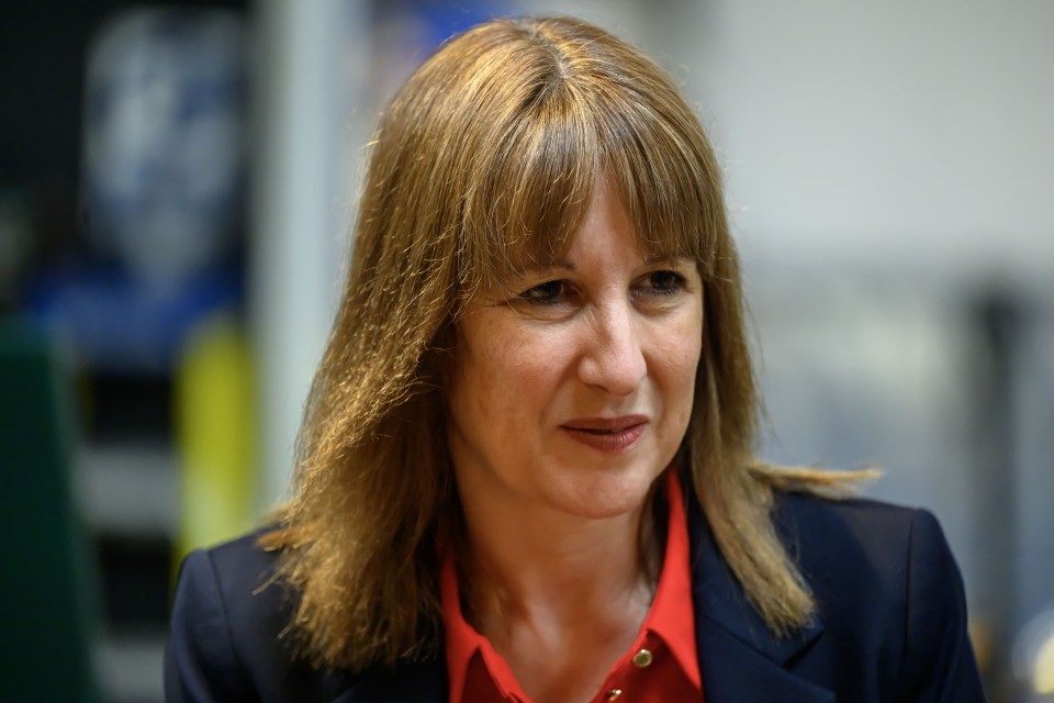 Rachel Reeves, Chancellor of the Exchequer, in a red shirt and dark blazer.