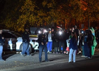 Protesters demonstrate against raids conducted by Immigration and Customs Enforcement outside the Department of Homeland Security office in Charlotte, North Carolina, on Nov. 16, 2025.