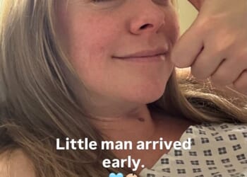 Liz McClarnon has welcomed her first child with her husband Peter Cho after years of 'painful IVF', sharing a thumbs up selfie from hospital on Sunday