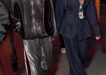 Louis Tomlinson and girlfriend Zara McDermott were quite literally in Paradise on Saturday during a rare joint appearance at the Las Vegas Grand Prix