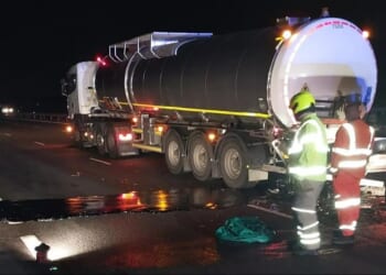 M40 closed after serious crash involving car and tanker with spillage clean up causing severe delays