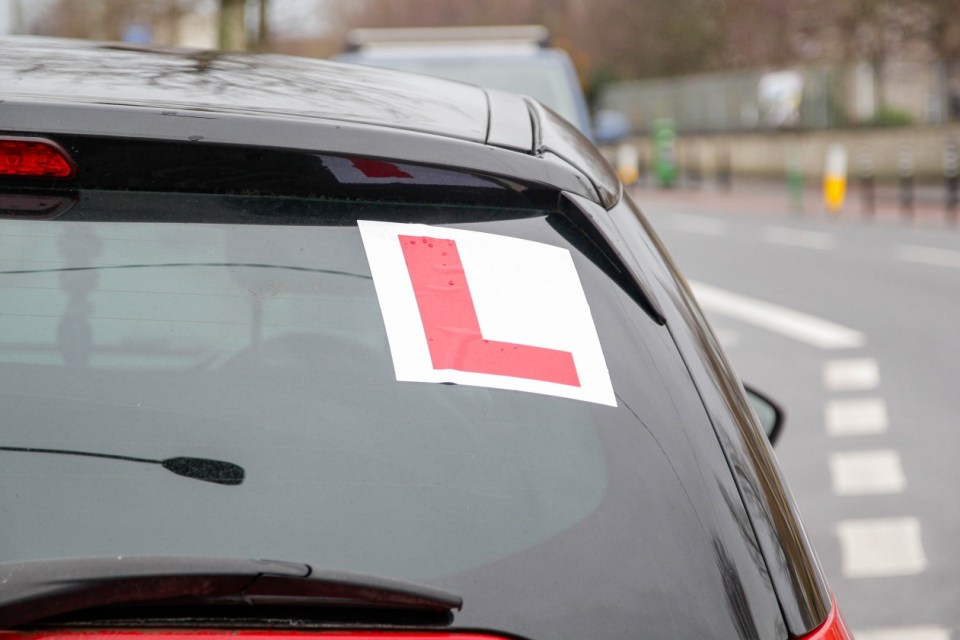 L-plate on the back of a car.
