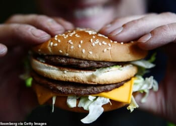 A 22-year-old man is fighting for his life in hospital after he swallowed an entire burger while having a meal with his friends 'for a joke' (file image)
