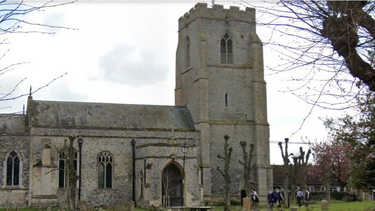 St Peter's Church in Brandon, England, on a cloudy day.