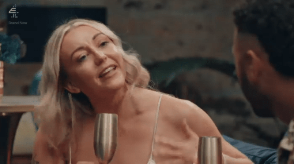 Sarah from Married at First Sight looking to the right and talking while gesturing with her left hand.