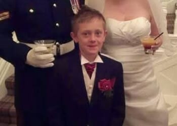 Robert Purkiss, wearing the formal attire of the Lancashire Regiment, and Kelly Purkiss on their wedding day. She insisted her husband is innocent and will be vindicated