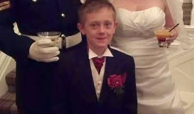 Robert Purkiss, wearing the formal attire of the Lancashire Regiment, and Kelly Purkiss on their wedding day. She insisted her husband is innocent and will be vindicated