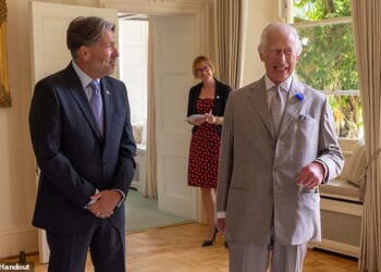 Guernsey Finance CEO, who last year met King Charles, has quit after he was caught on camera in a compromising position with a female colleague