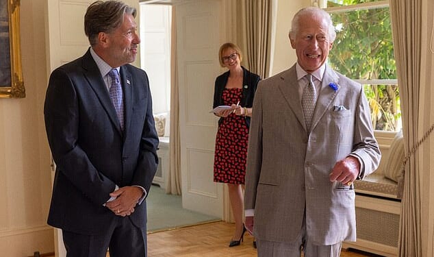 Guernsey Finance CEO, who last year met King Charles, has quit after he was caught on camera in a compromising position with a female colleague