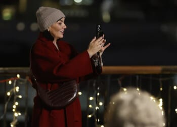 Ms McCutcheon, 49, who played Natalie, the Downing Street tea lady who stole prime minister Hugh Grant ’s heart, was seen wearing the same red coat that became one of the most memorable outfits from the film