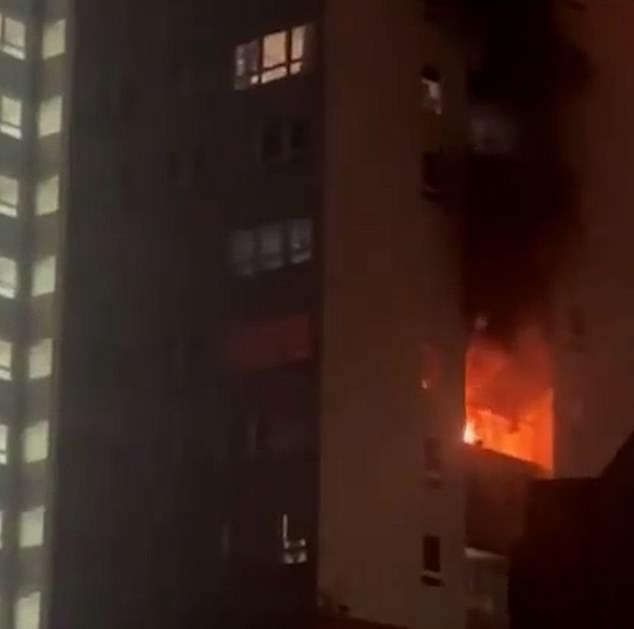 Video posted on social media shows the blaze on a third floor balcony in Huyton, Liverpool