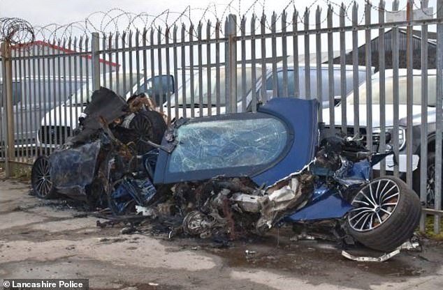 The £100,000 car was a complete write-off after the high-speed collision. Pictured: The scrapped remains of the car
