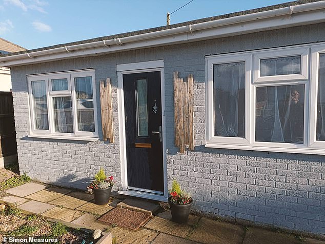 On either side of his front-door hang two pieces of plaster wood which he jokes he 'touches for good luck' every time he leaves the house