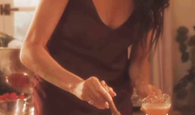 Meghan Markle opted for a very festive look in her latest promotional video for As ever - as she gushed over strolling through fields of sage with her family