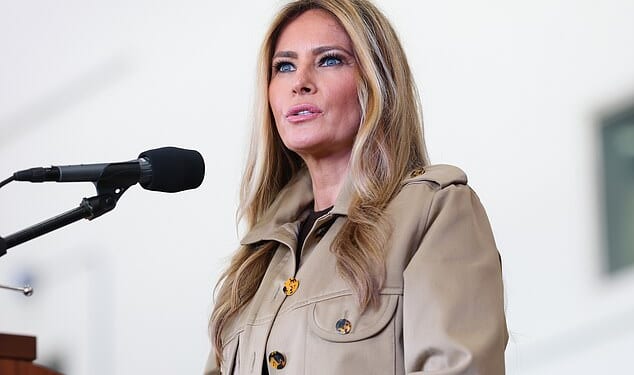 First lady Melania Trump delivers remarks to military personnel and their families during a visit to MV-22 Mega Hangar on Marine Corps Air Station New River on November 19, 2025 in Jacksonville, North Carolina