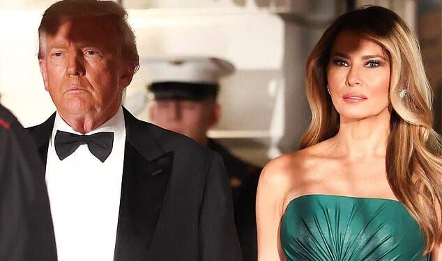 President Donald Trump (left) and First Lady Melania Trump (right) wait for the arrival of Saudi Crown Prince Mohammed bin Salman for a dinner in the East Room Tuesday night at the White House