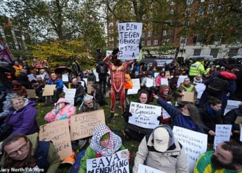Campaigners at the Defend Our Juries protest in support of Palestine Action at The Peace Garden, Tavistock Square, central London. Picture date: Saturday November 22, 2025